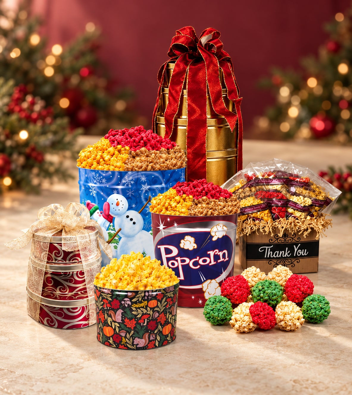 Holiday popcorn tins, ribbon-wrapped gift towers, snack gifts, and red, green, and white popcorn balls